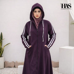 A woman is wearing a modest, sporty-style long outer garment in a deep  color.